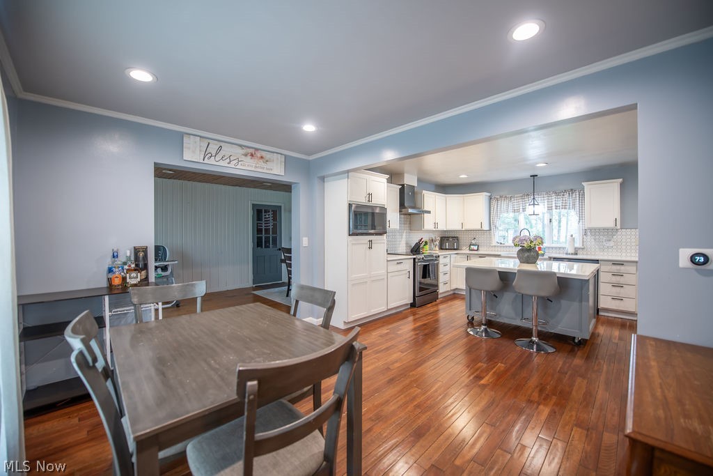 827 East 5th Street Dover, OH 44622 - Photo 13 of 38 Spacious and inviting dining room flowing into the large kitchen area
