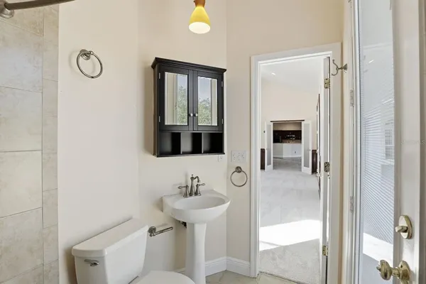 a bathroom with a sink and mirror