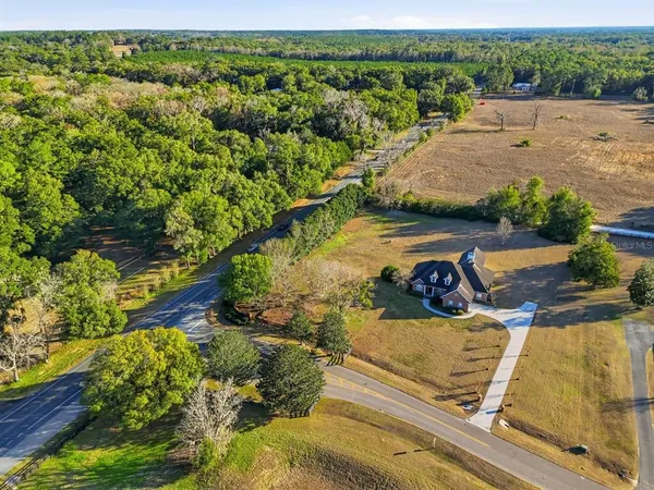 a view of a lake with a yard