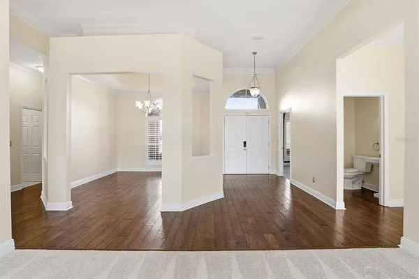 a view of a livingroom with wooden floor