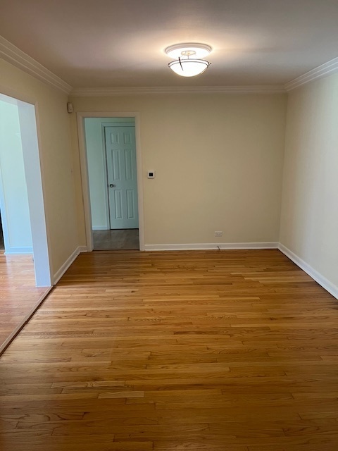 7740 South County Line Road Burr Ridge, IL 60527 - Photo 7 of 13 wooden floor in an empty room