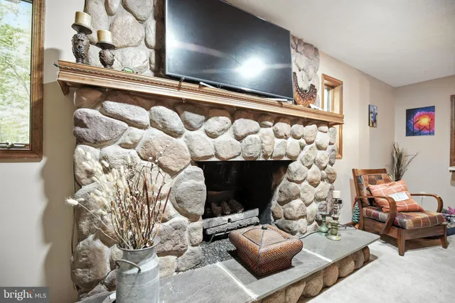 a bedroom with a bed and ceiling fan