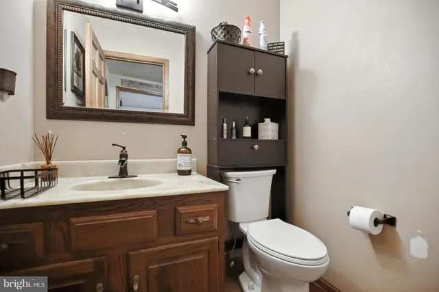 a view of an outdoor sitting area with brick walls