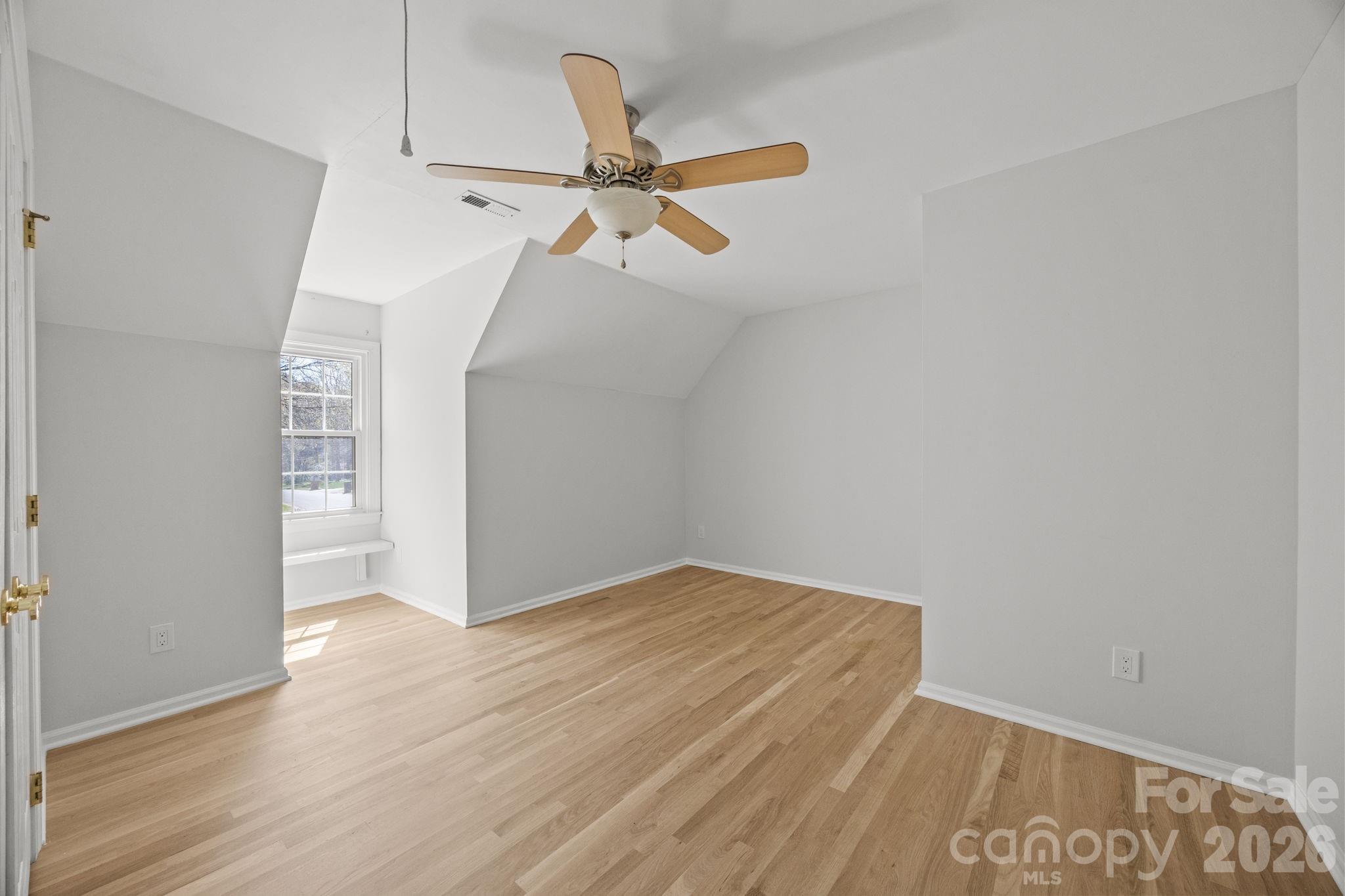 5243 Mintridge Road Mint Hill, NC 28227 - Photo 31 of 43 a view of empty room with wooden floor