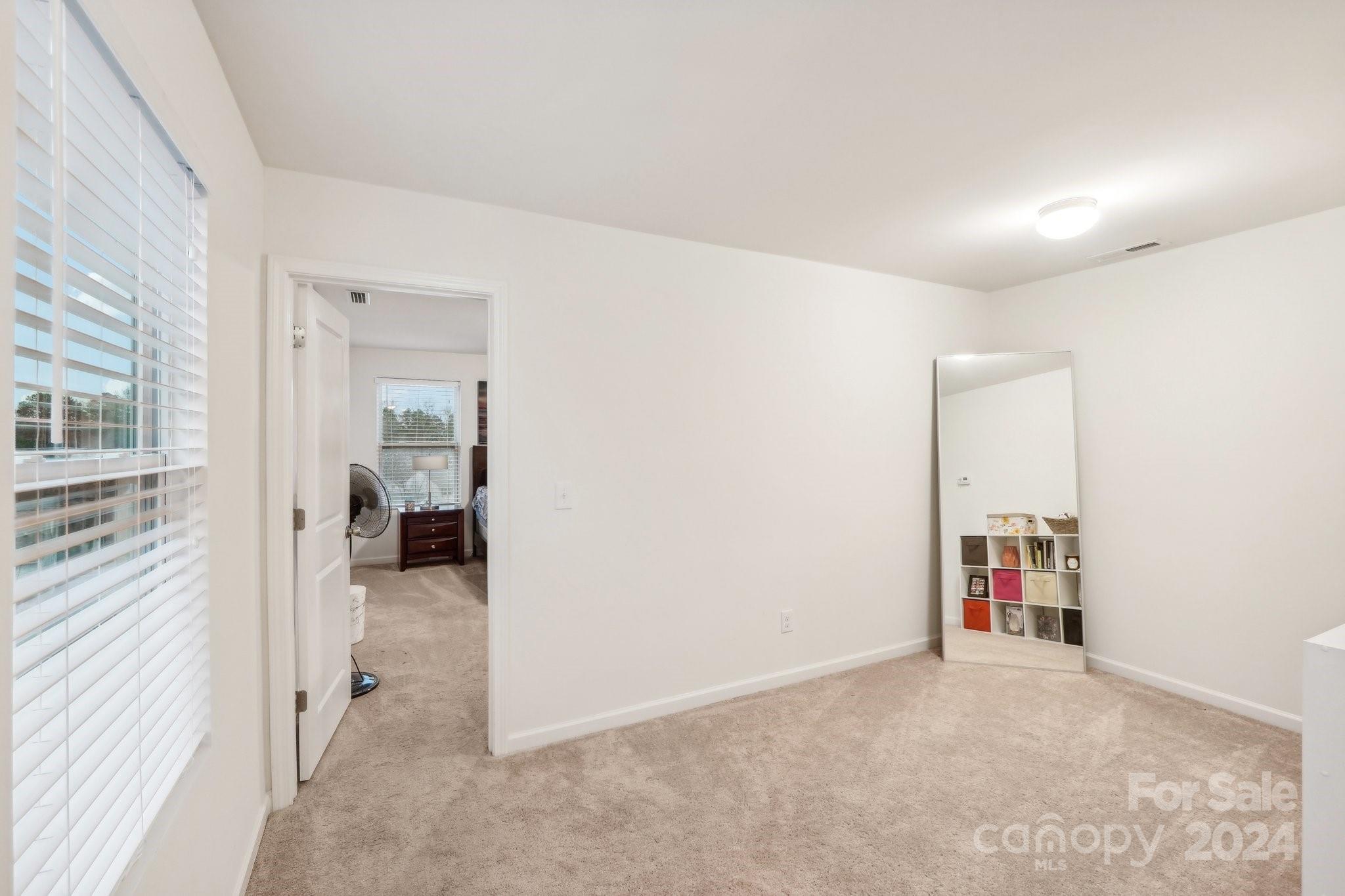 1065 Ramsgate Drive Southwest Concord, NC 28025 - Photo 28 of 47 a view of a bedroom with a furniture and closet