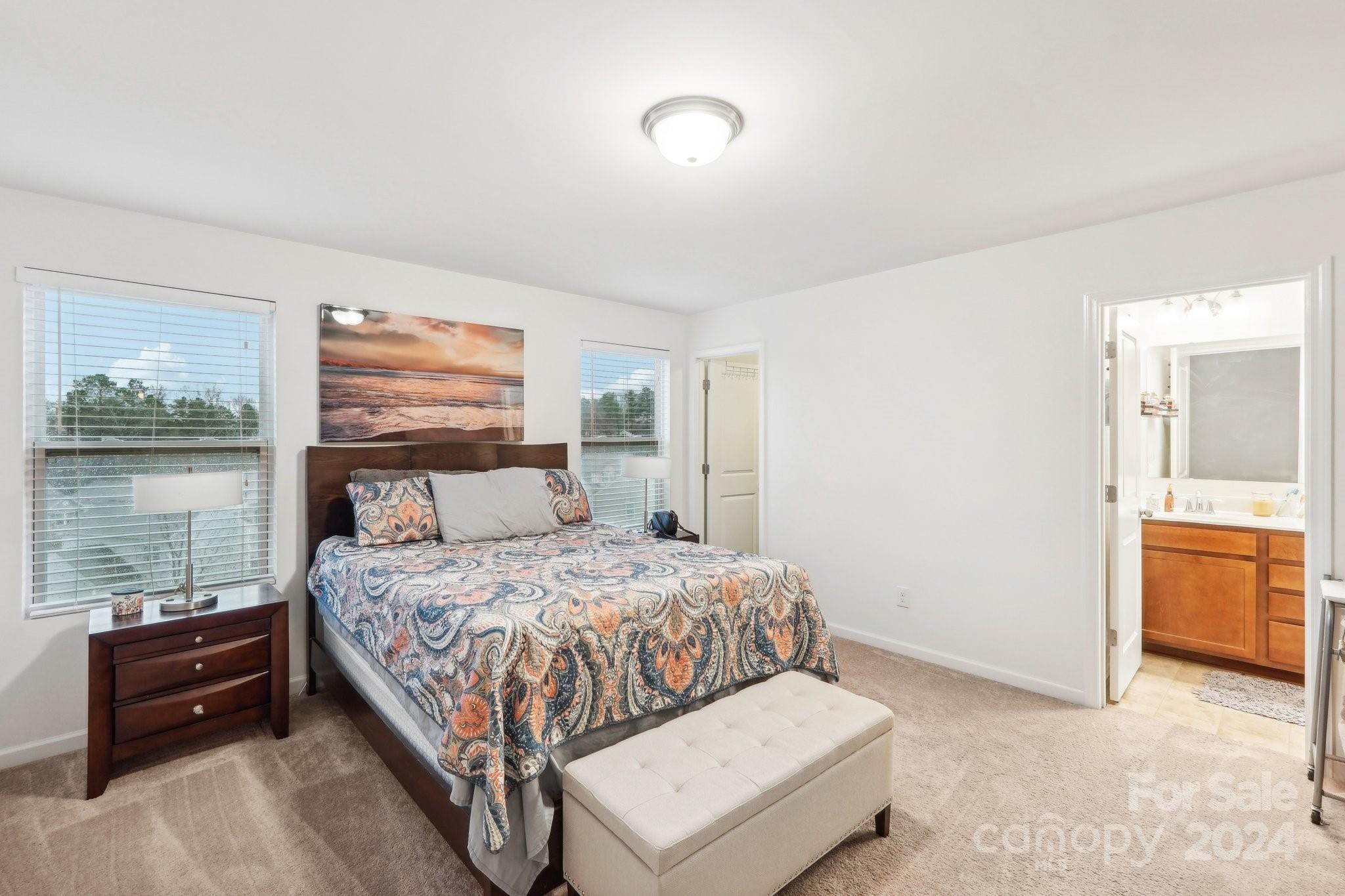 1065 Ramsgate Drive Southwest Concord, NC 28025 - Photo 30 of 47 a bedroom with a bed and a dresser next to a window