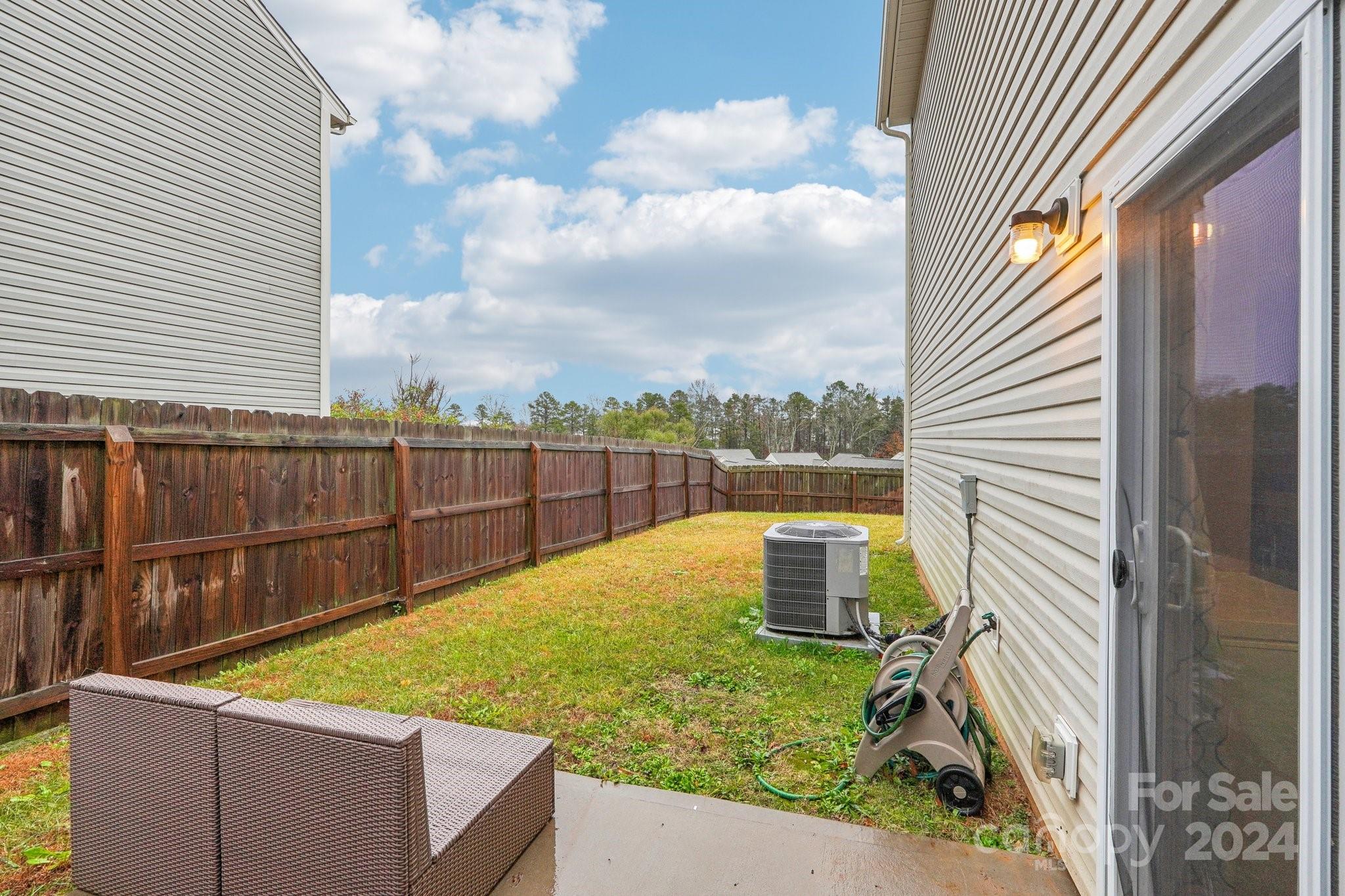 1065 Ramsgate Drive Southwest Concord, NC 28025 - Photo 43 of 47 a view of a backyard