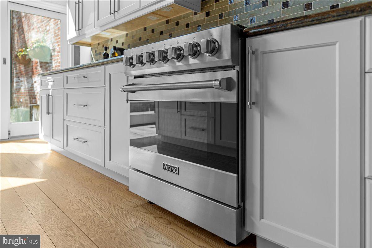 314 Fitzwater Street Philadelphia, PA 19147 - Photo 13 of 51 a stove top oven sitting inside of a kitchen