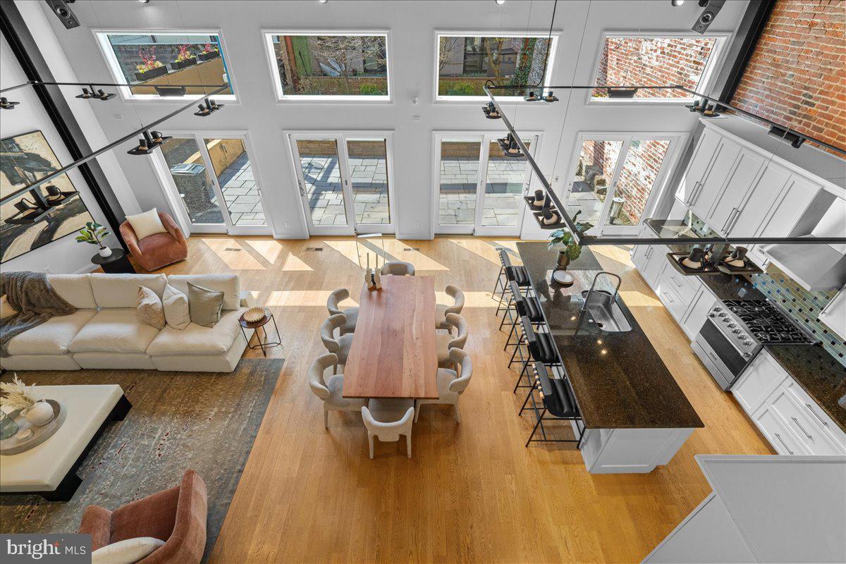 314 Fitzwater Street Philadelphia, PA 19147 - Photo 17 of 51 a view of living room with furniture and floor to ceiling windows