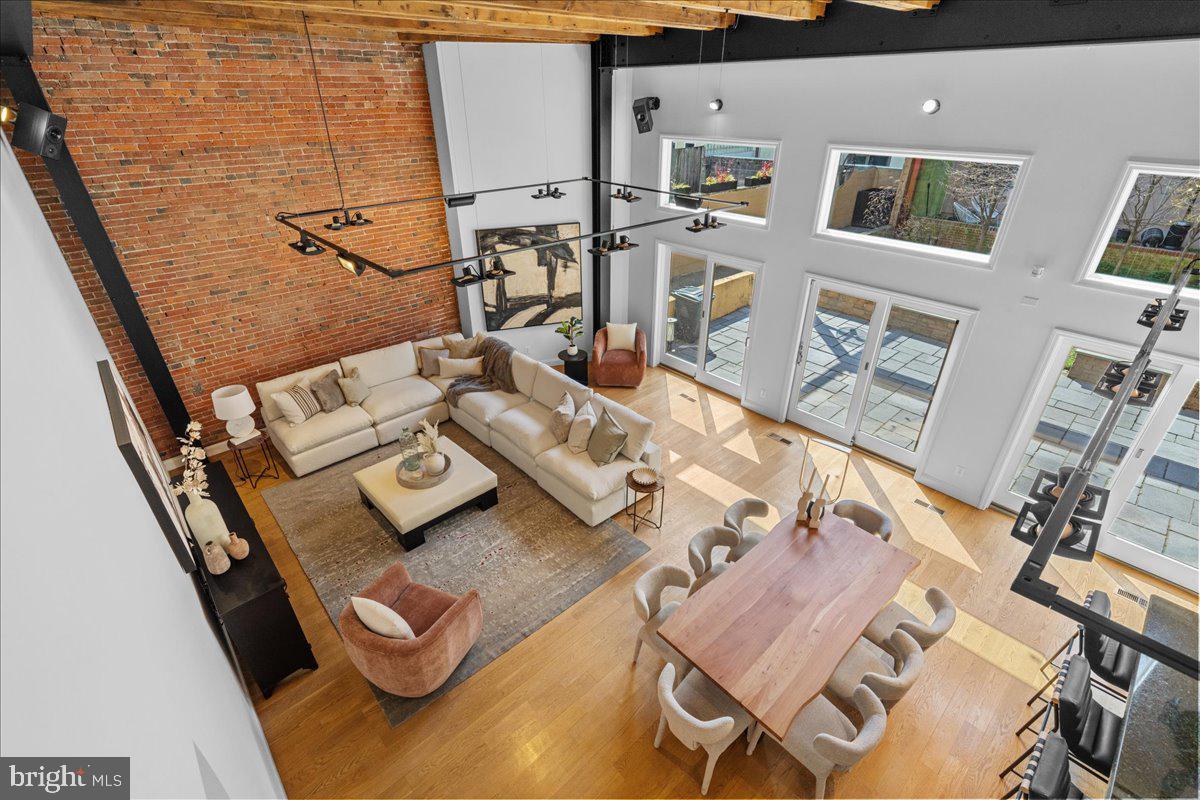 314 Fitzwater Street Philadelphia, PA 19147 - Photo 18 of 51 a living room with furniture and floor to ceiling windows