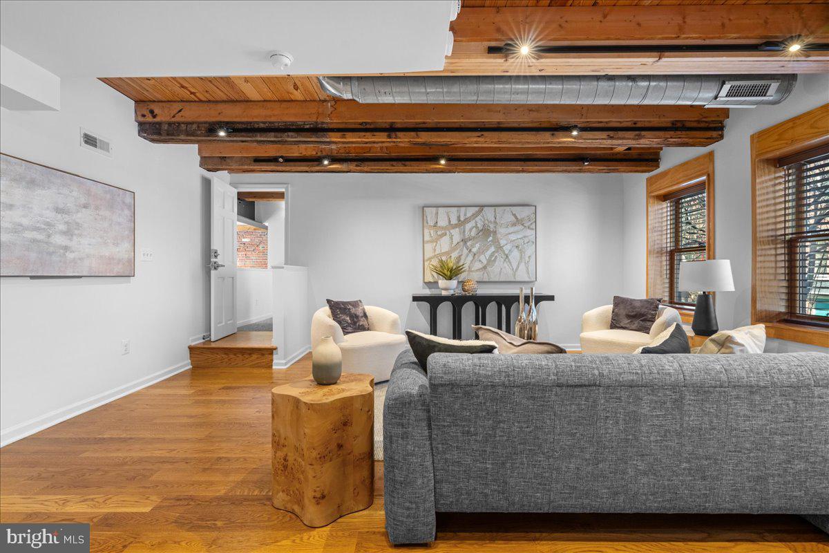 314 Fitzwater Street Philadelphia, PA 19147 - Photo 22 of 51 a living room with furniture and a window