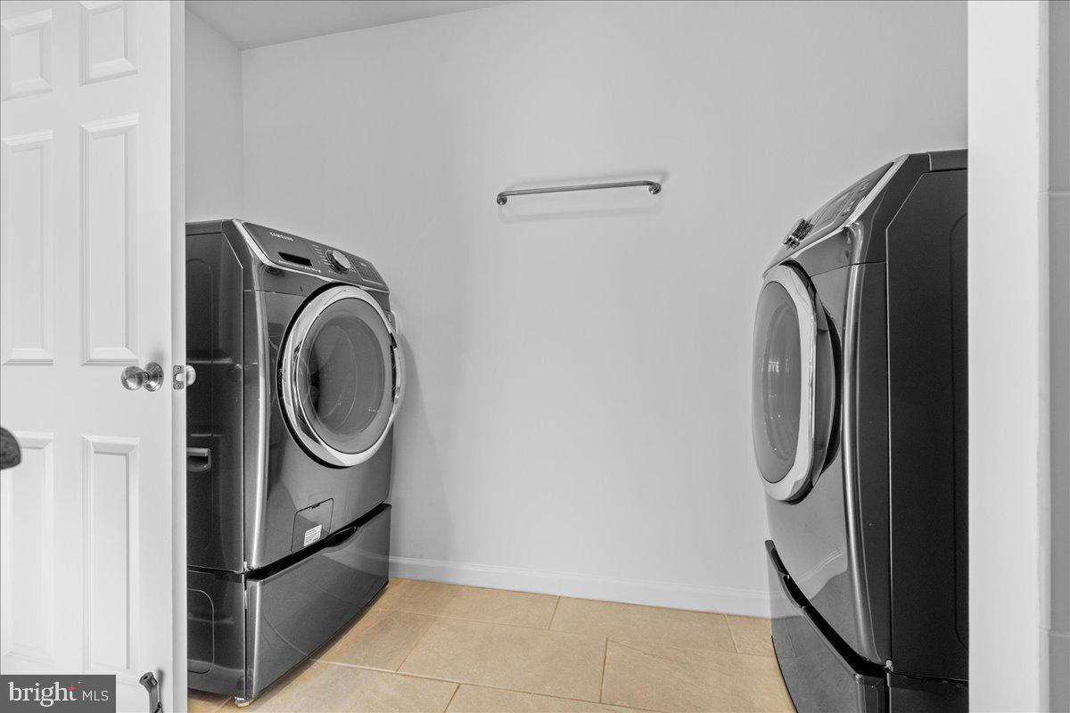 314 Fitzwater Street Philadelphia, PA 19147 - Photo 40 of 51 a utility room with dryer and washer