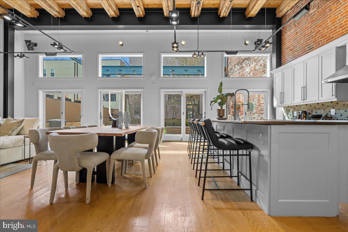 314 Fitzwater Street Philadelphia, PA 19147 - Photo 4 of 51 a view of a dining room with furniture and wooden floor