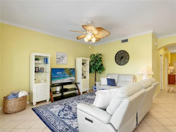 a living room with furniture and a couch