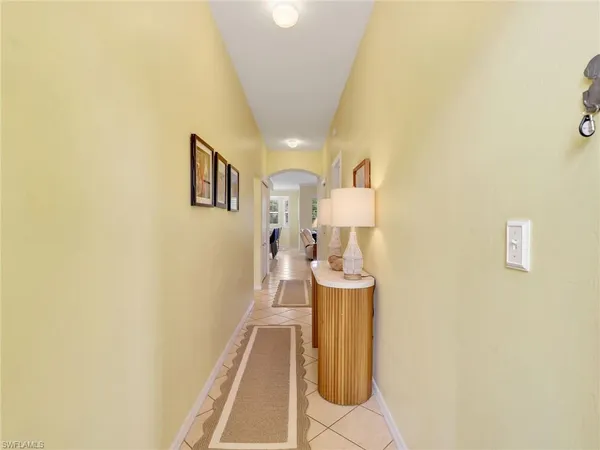 a view of a hallway with a furniture