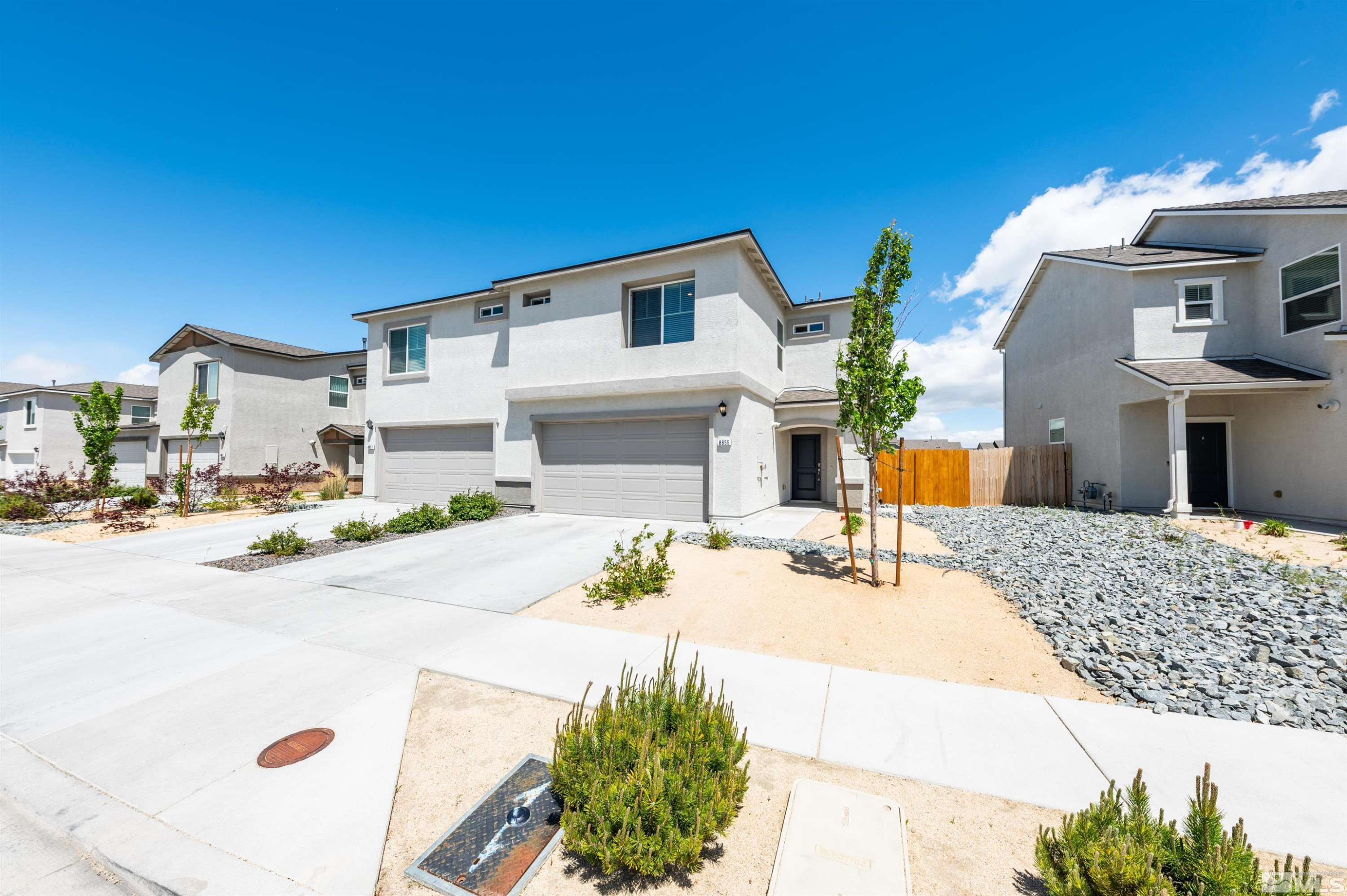 8855 Wolf Moon Drive Reno, NV 89506 - Photo 1 of 35 a view of a house with a patio
