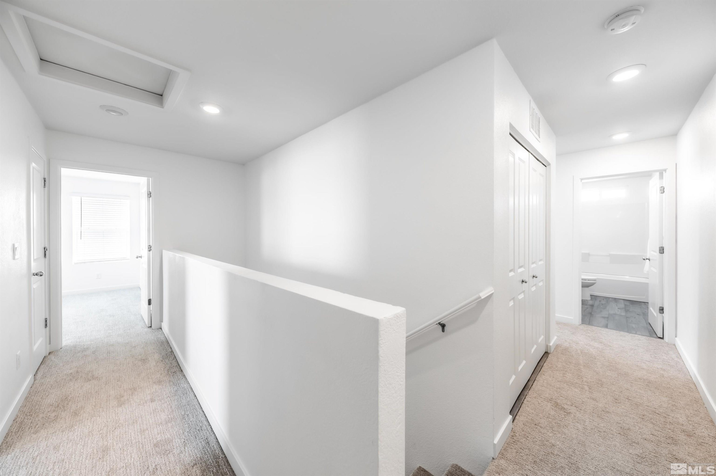 8855 Wolf Moon Drive Reno, NV 89506 - Photo 14 of 35 a view of a hallway with bathroom