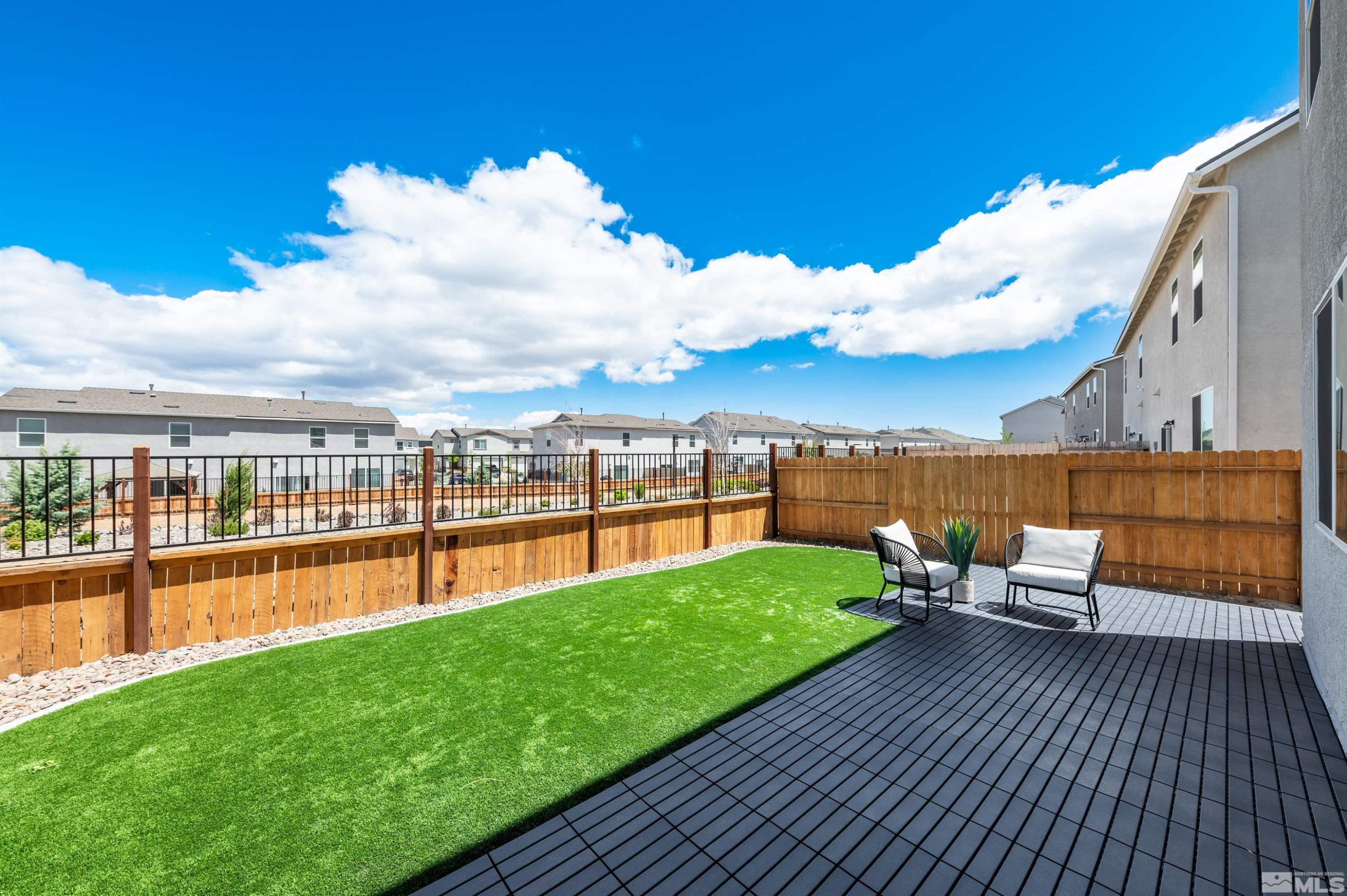 8855 Wolf Moon Drive Reno, NV 89506 - Photo 28 of 35 a view of a swimming pool with a lounge chair