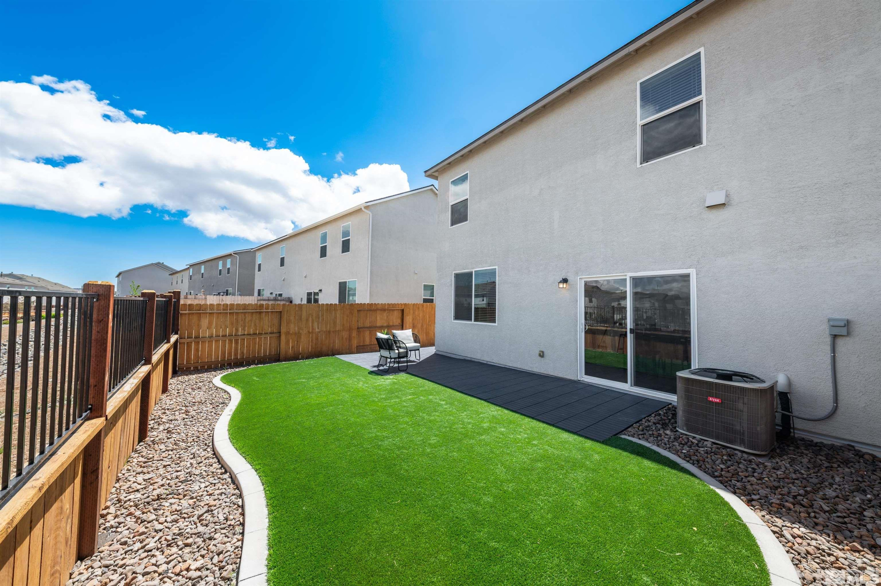 8855 Wolf Moon Drive Reno, NV 89506 - Photo 29 of 35 a house view with a garden space