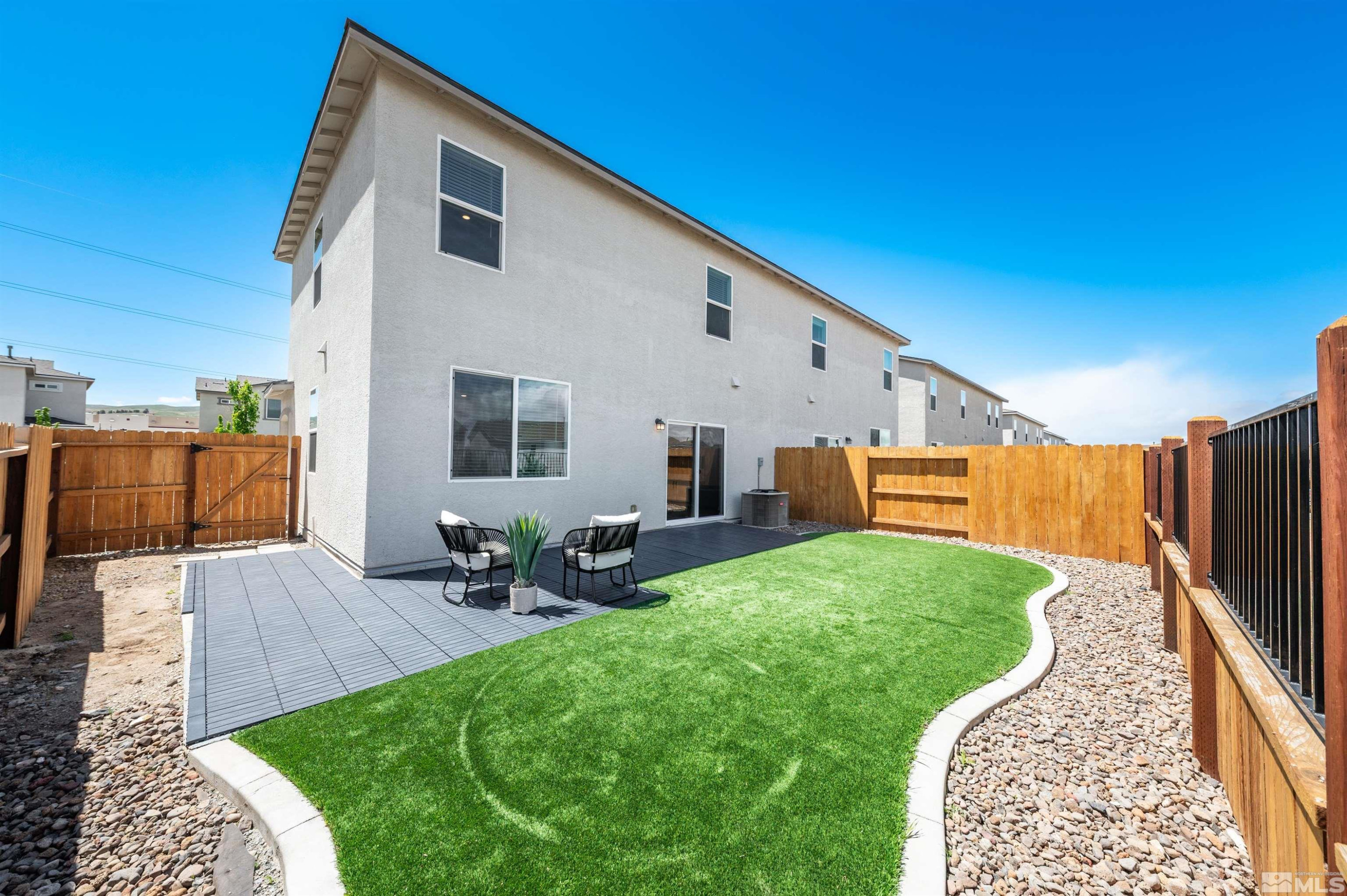 8855 Wolf Moon Drive Reno, NV 89506 - Photo 31 of 35 a view of backyard with patio