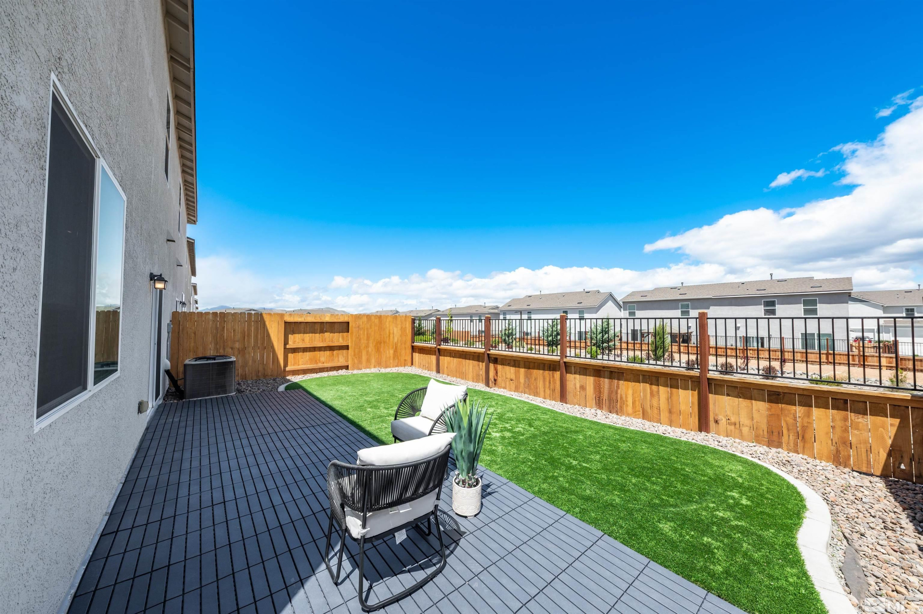 8855 Wolf Moon Drive Reno, NV 89506 - Photo 32 of 35 a view of a swimming pool with a lounge chair