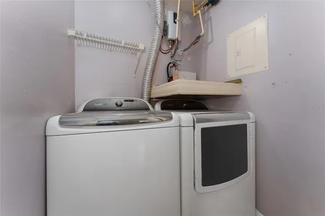 a utility room with dryer and washer