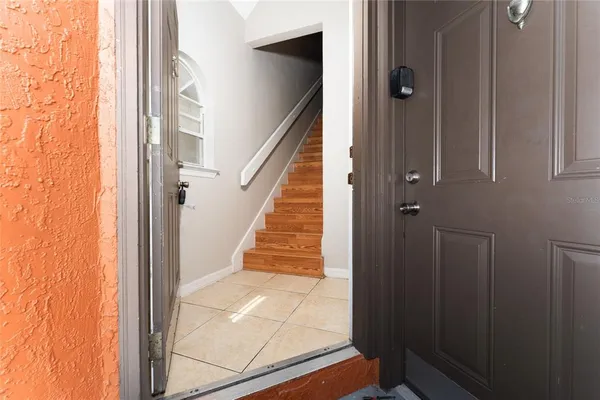 a view of entryway with wooden floor