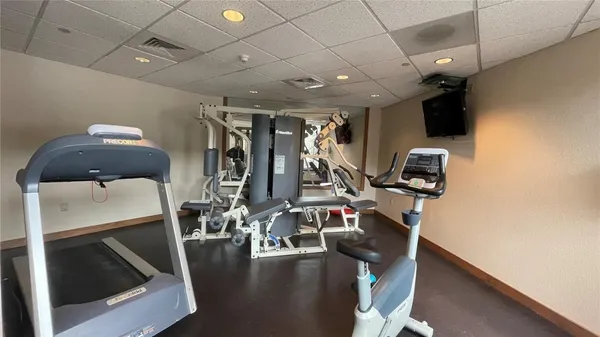 a view of a room with gym equipment