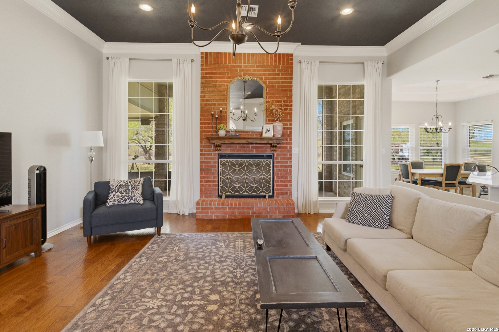 105 Old Campbell Road Seguin, TX 78155 - Photo 15 of 49 a living room with furniture and a fireplace