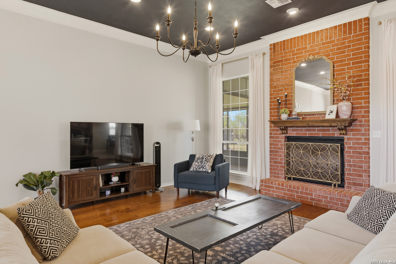 105 Old Campbell Road Seguin, TX 78155 - Photo 16 of 49 a living room with furniture and a flat screen tv