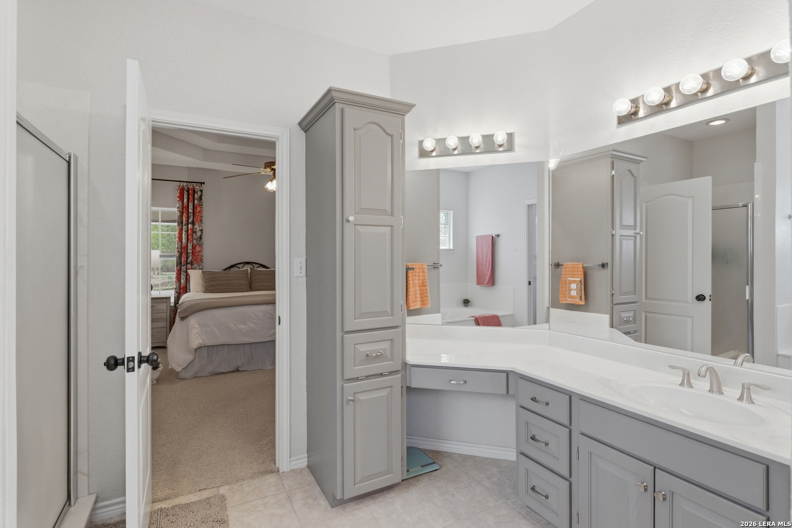 105 Old Campbell Road Seguin, TX 78155 - Photo 22 of 49 a en suite bathroom with a double vanity sink mirror and double