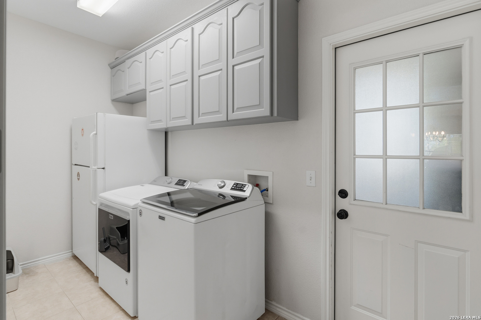105 Old Campbell Road Seguin, TX 78155 - Photo 28 of 49 a kitchen with stainless steel appliances granite countertop a sink and a refrigerator