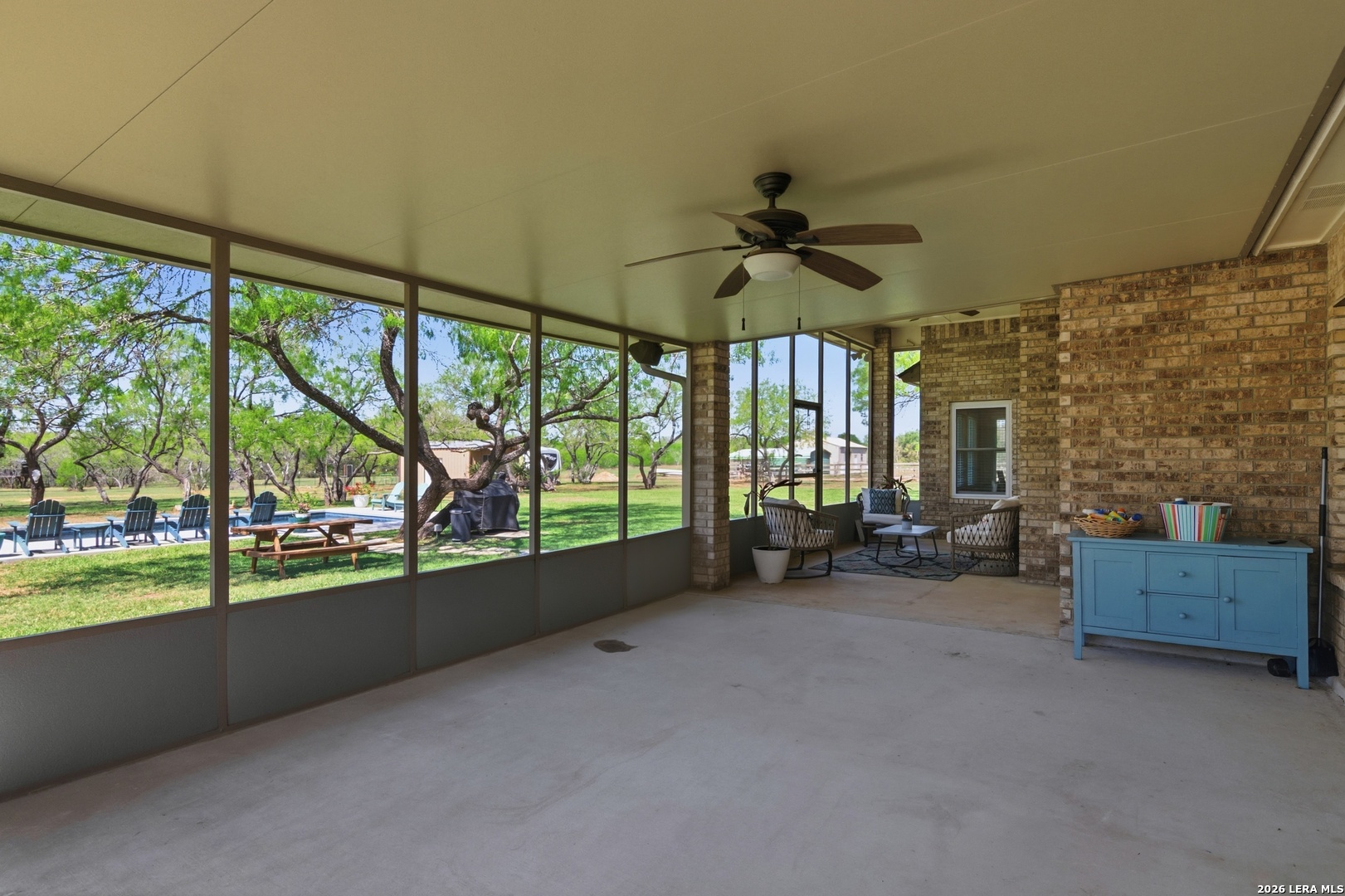 105 Old Campbell Road Seguin, TX 78155 - Photo 31 of 49 an empty room with furniture and a large window