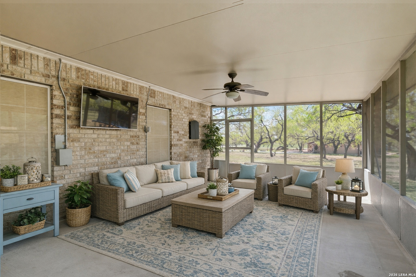 105 Old Campbell Road Seguin, TX 78155 - Photo 32 of 49 a living room with furniture and a flat screen tv