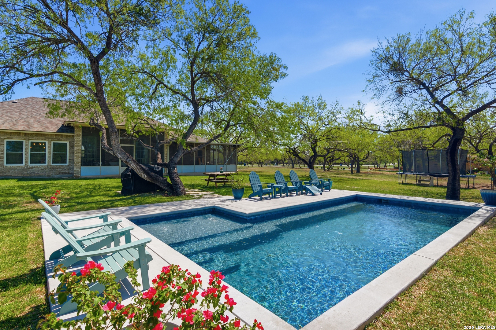 105 Old Campbell Road Seguin, TX 78155 - Photo 34 of 49 a view of a house with swimming pool and sitting area