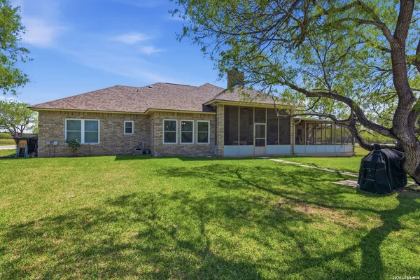 a view of a house with a garden