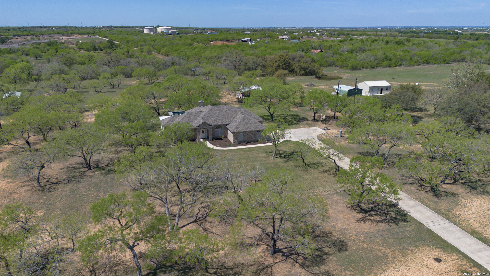 105 Old Campbell Road Seguin, TX 78155 - Photo 47 of 49 an aerial view of residential houses with outdoor space and trees