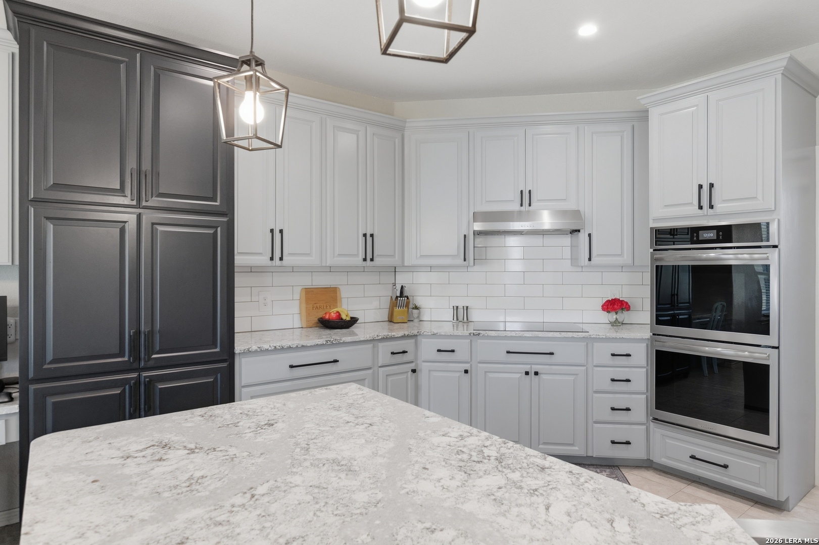 105 Old Campbell Road Seguin, TX 78155 - Photo 9 of 49 a kitchen with stainless steel appliances a refrigerator sink and cabinets