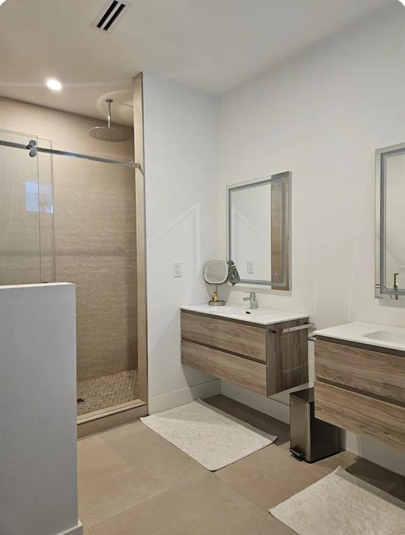 2275 Southeast 7th Street Pompano Beach, FL 33062 - Photo 13 of 14 a view of bathroom with bathtub shower and mirror
