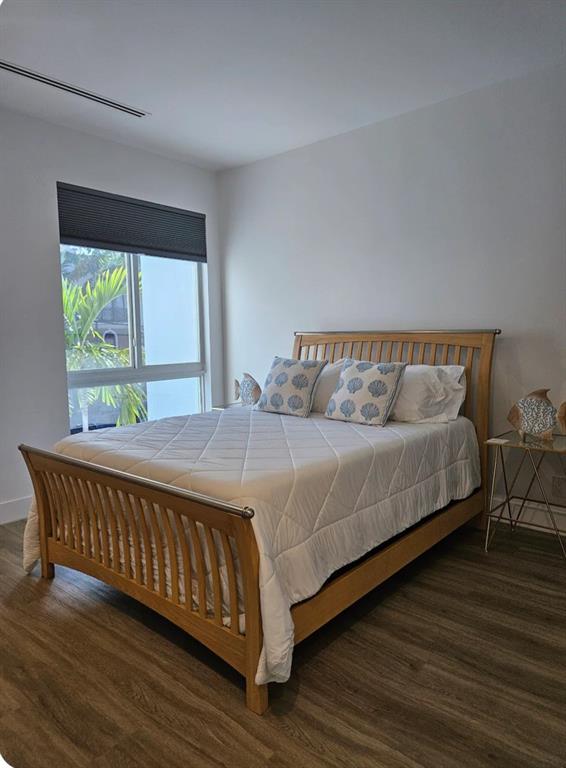 2275 Southeast 7th Street Pompano Beach, FL 33062 - Photo 6 of 14 a bedroom with a bed and window