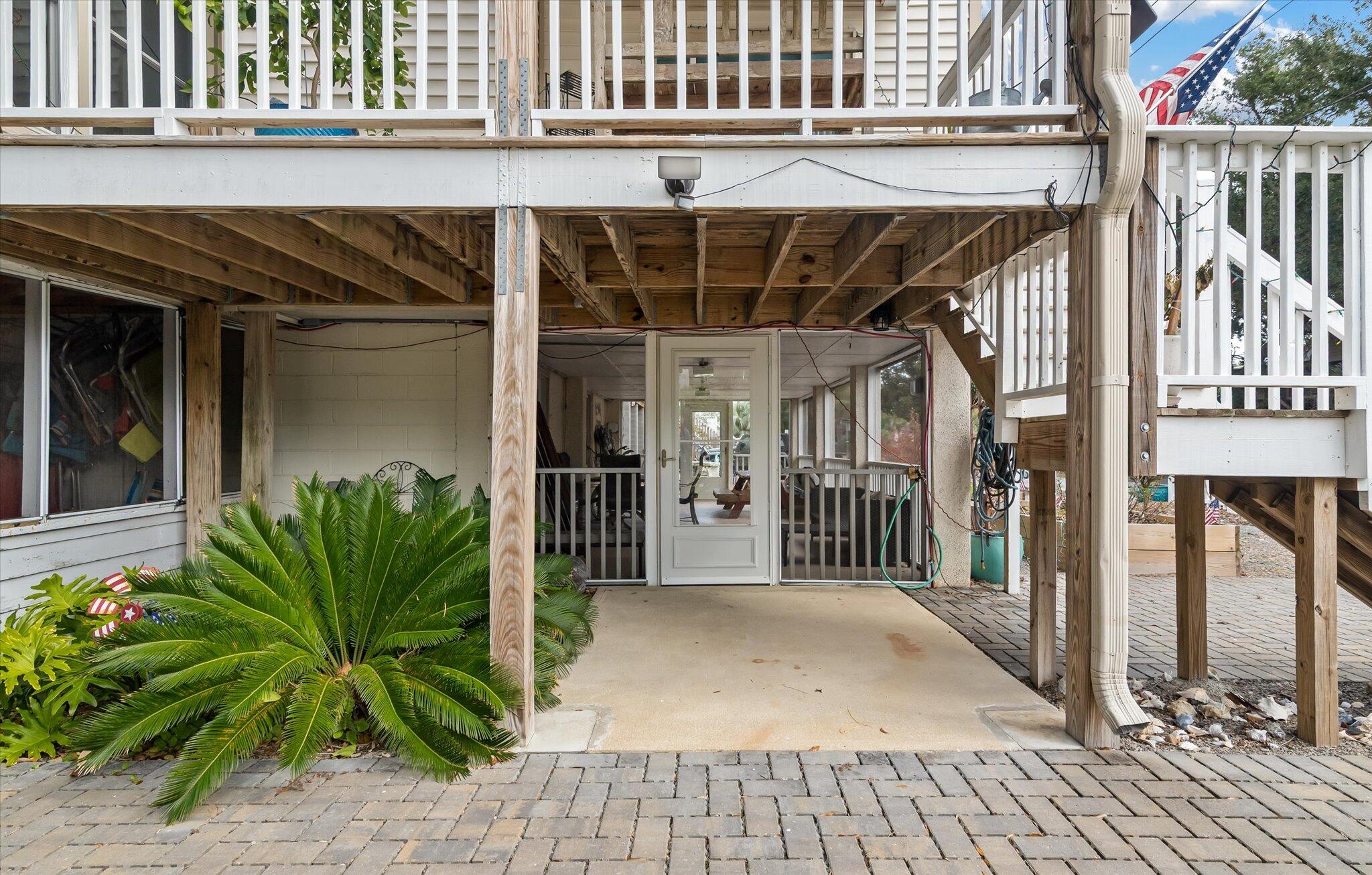 2403 Cameron Boulevard Isle of Palms, SC 29451 - Photo 29 of 52 Downstairs Screened Porch Entry