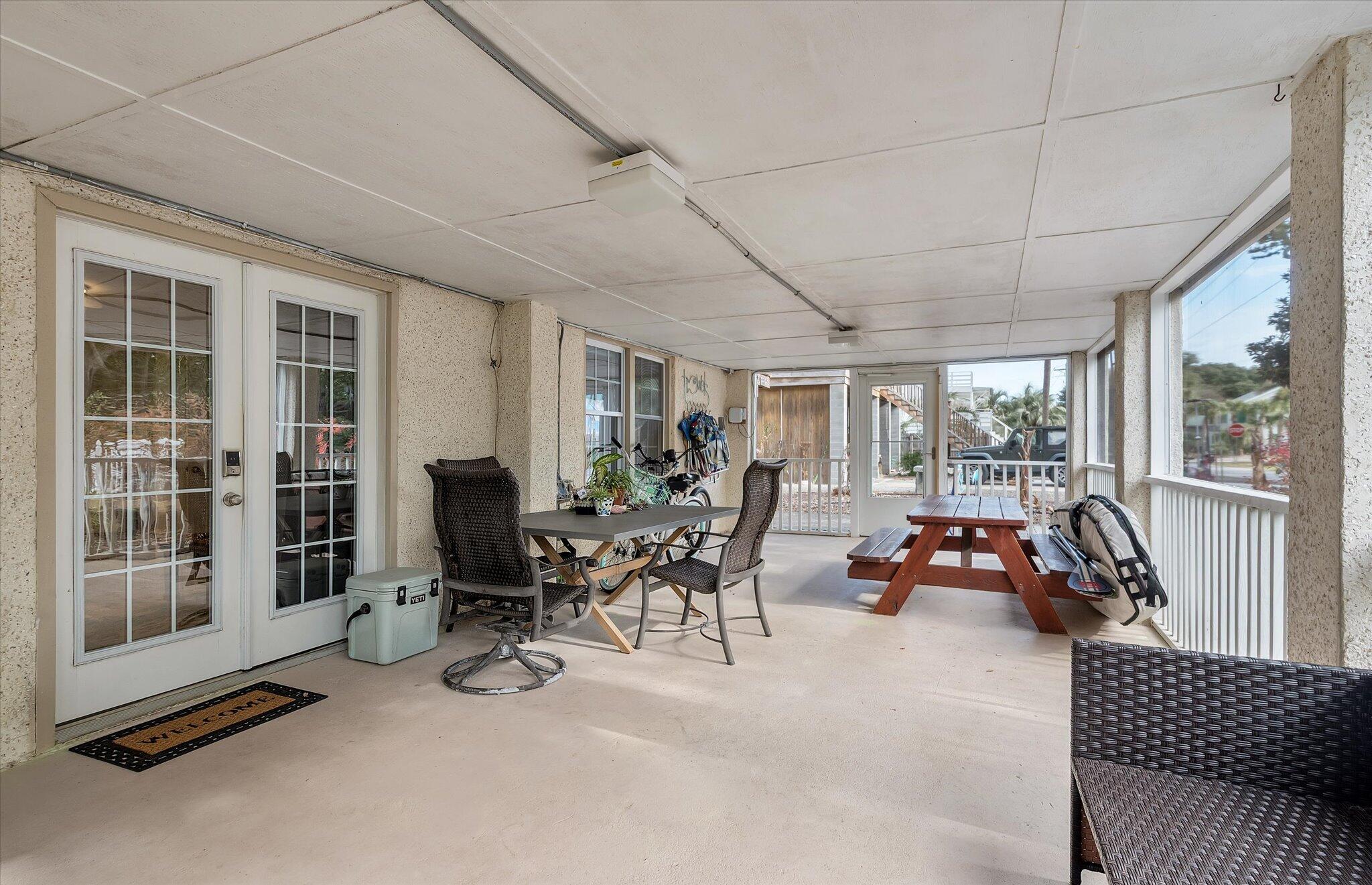 2403 Cameron Boulevard Isle of Palms, SC 29451 - Photo 30 of 52 Downstairs Screened Porch