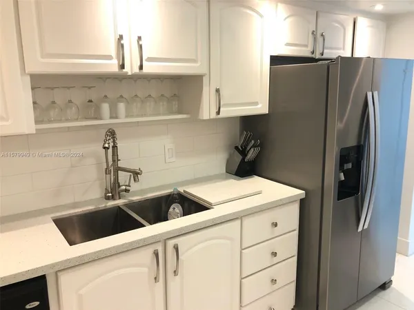 a bathroom with a toilet and a tub