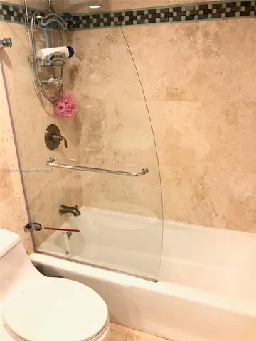 a view of a balcony with chairs