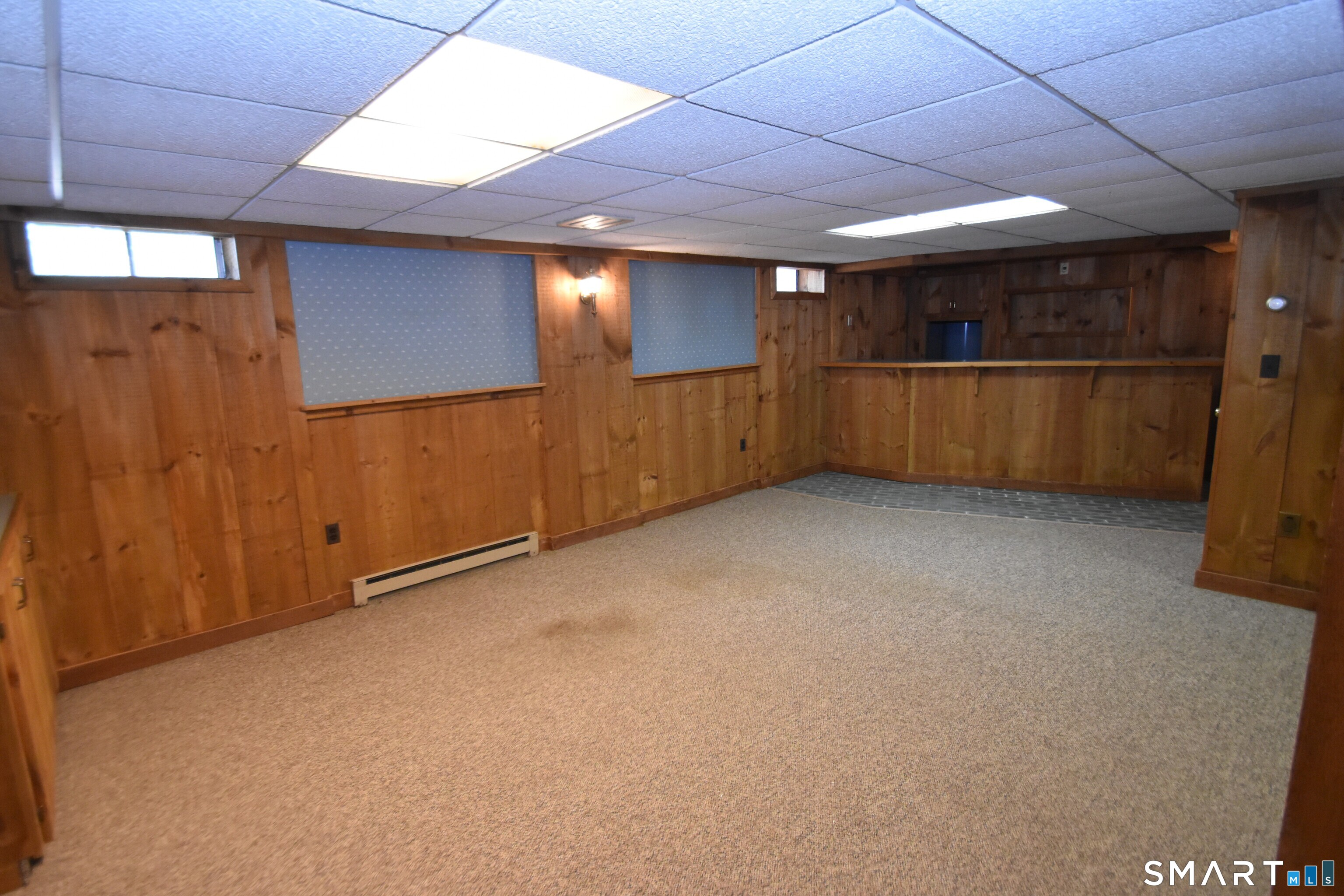 77 Winthrop Road Manchester, CT 06040 - Photo 14 of 17 Rec Room with Dry Bar