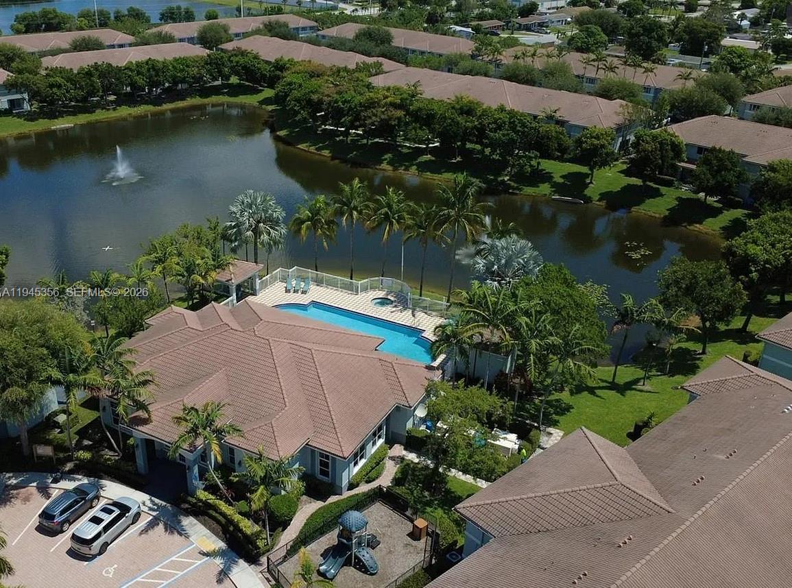 1916 Alamanda Way Riviera Beach, FL 33404 - Photo 3 of 22 an aerial view of a house with outdoor space and lake view