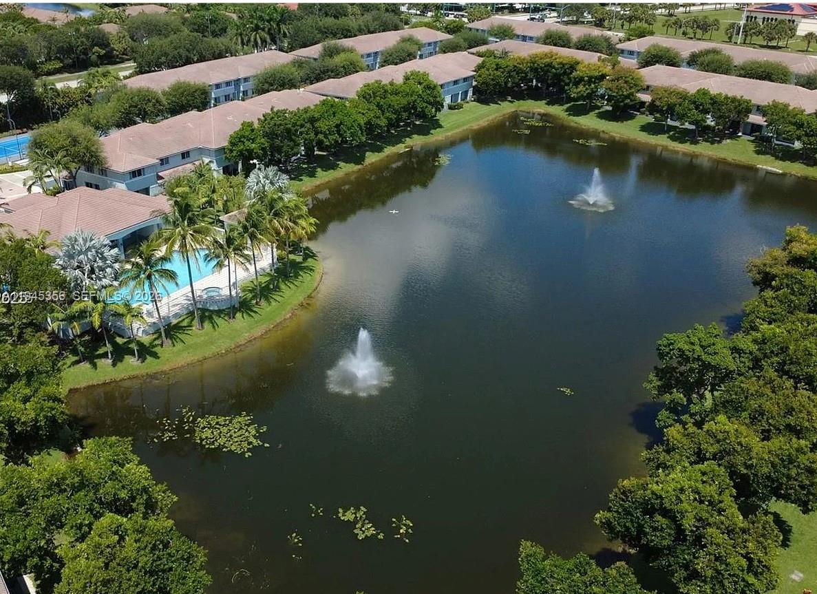1916 Alamanda Way Riviera Beach, FL 33404 - Photo 5 of 22 an aerial view of residential house with outdoor space and lake view