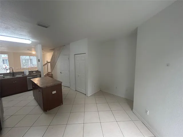 a kitchen with a cabinets and counter space