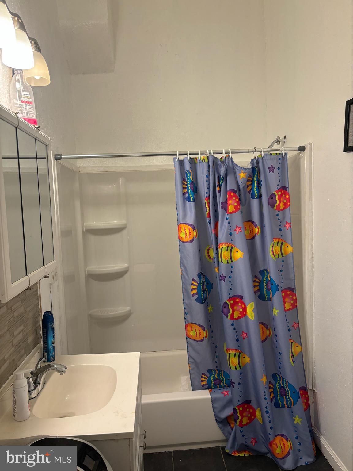 4328 Frankford Avenue, Unit 2A Philadelphia, PA 19124 - Photo 14 of 20 a bathroom with a sink toilet and shower