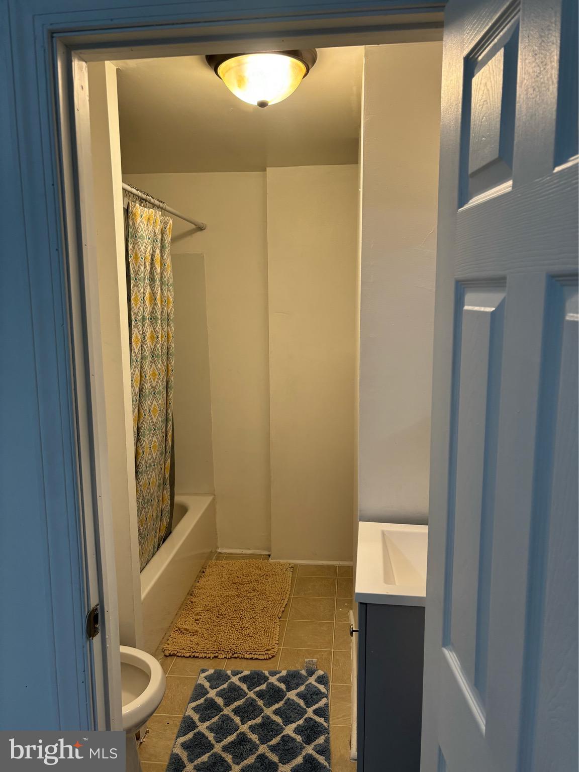 4328 Frankford Avenue, Unit 2A Philadelphia, PA 19124 - Photo 19 of 20 a bathroom with a shower and a sink